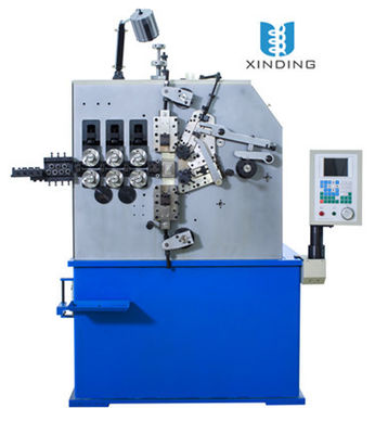 De blauwe Drie As Automatische Lente die Machine met Hoogte Servomotor 1.5 rollen KW